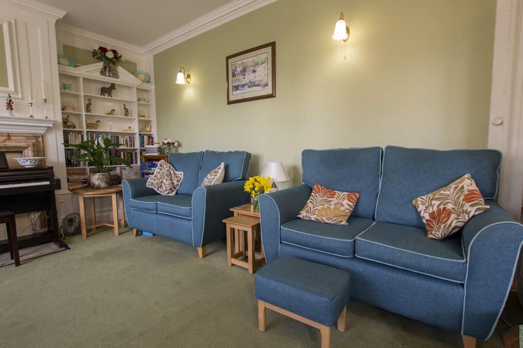 The Featherton House care home lounge complete with original features.