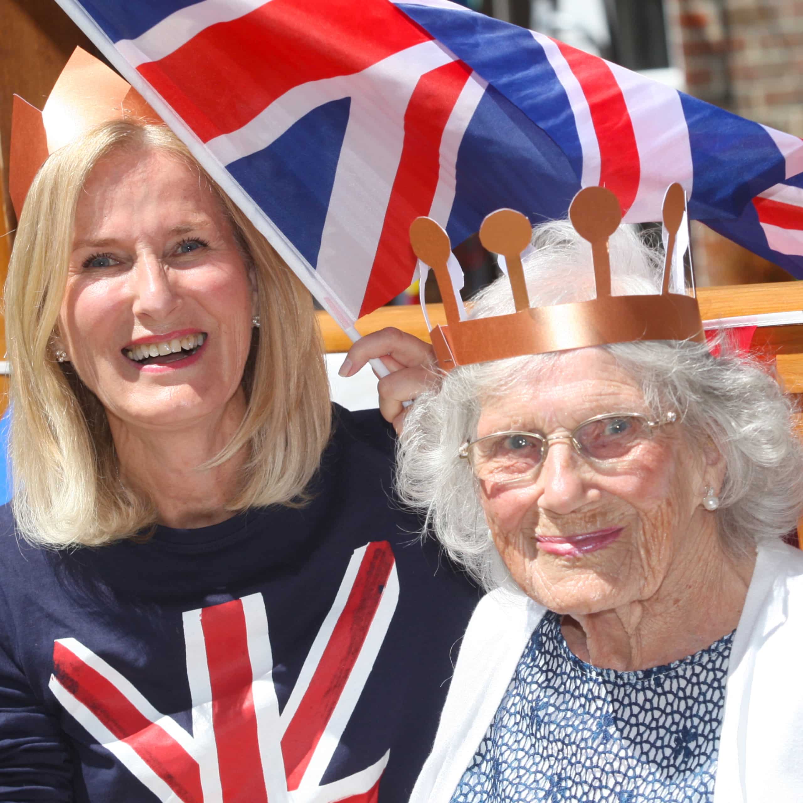 A resident and her relative enjoy a platinum jubilee celebration to open the new garden at Westerham Place Care Home in Sevenoaks, Kent.